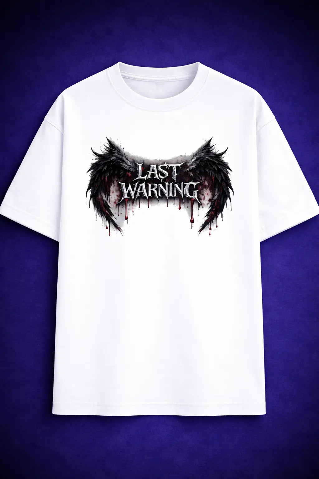 White oversized t shirt with black wings and “Last Warning” graphic – Maxedoutt streetwear